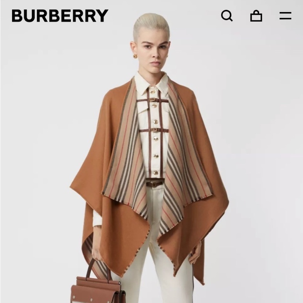 Amazing Burberry cape never worn! Very versatile, can be worn on both si…